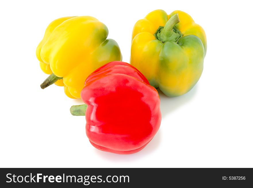 Three peppers (paprika) - red and yellow-green vegetables on overwhite background. Three peppers (paprika) - red and yellow-green vegetables on overwhite background.