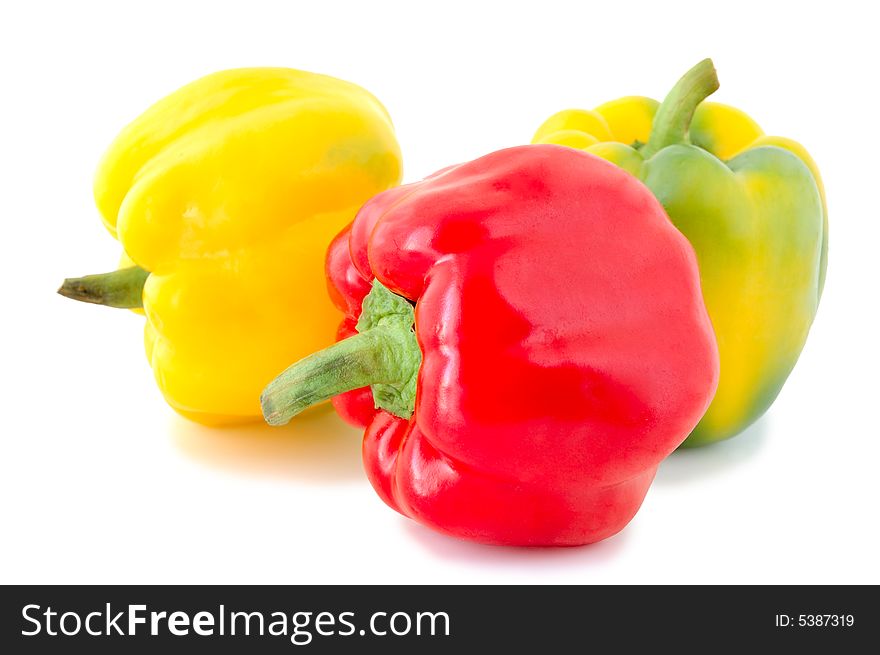 Three peppers (paprika) - red and yellow-green vegetables on overwhite background. Three peppers (paprika) - red and yellow-green vegetables on overwhite background.