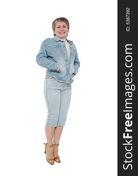 The woman in a jeans suit in a jump on a white background. The woman in a jeans suit in a jump on a white background