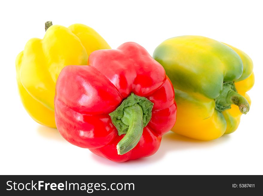 Three peppers (paprika) - red and yellow-green vegetables on overwhite background. Three peppers (paprika) - red and yellow-green vegetables on overwhite background.