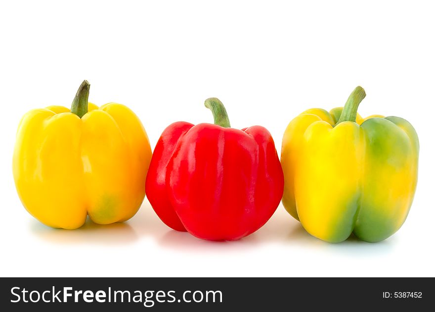 Three peppers (paprika) - red and yellow-green vegetables on overwhite background. Three peppers (paprika) - red and yellow-green vegetables on overwhite background.