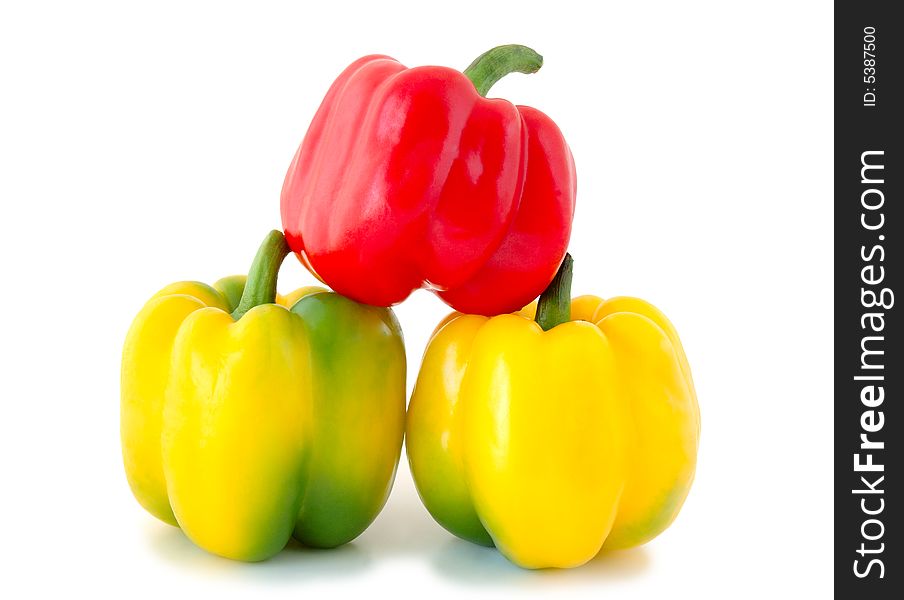 Three peppers (paprika) - red and yellow-green vegetables on overwhite background. Three peppers (paprika) - red and yellow-green vegetables on overwhite background.