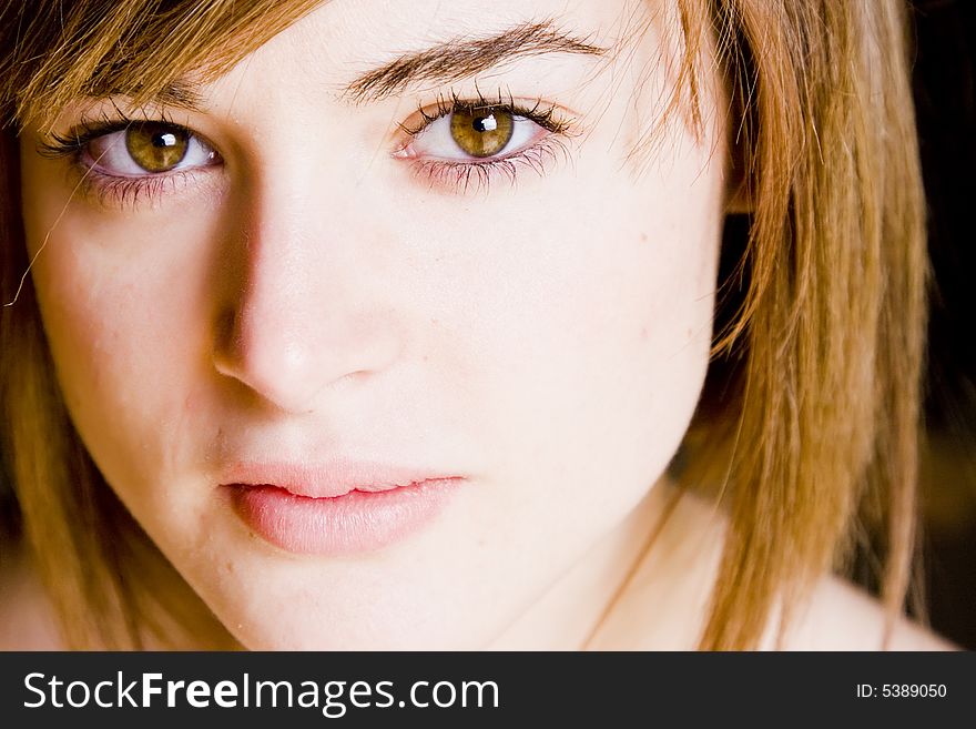 Young woman close portrait, high key