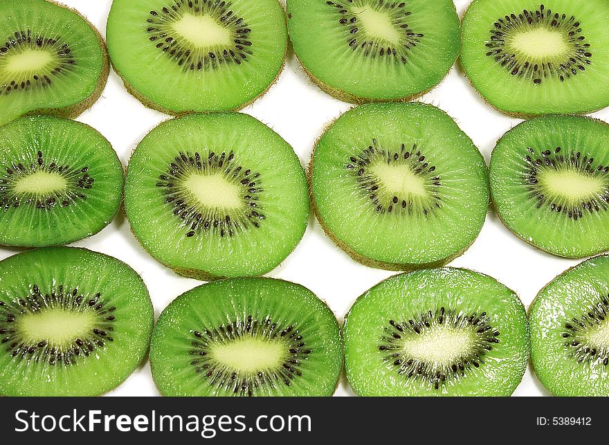 Isolate fresh kiwi fruit slices against white. Isolate fresh kiwi fruit slices against white