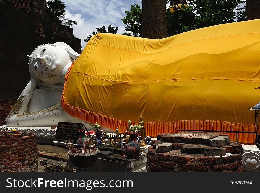 In Thailand the city of Ayutthaya was founded in 1350 today is an impressive archaeological park; here a view of the reclining Buddha at Wat Yai Chai Mongkhon. In Thailand the city of Ayutthaya was founded in 1350 today is an impressive archaeological park; here a view of the reclining Buddha at Wat Yai Chai Mongkhon