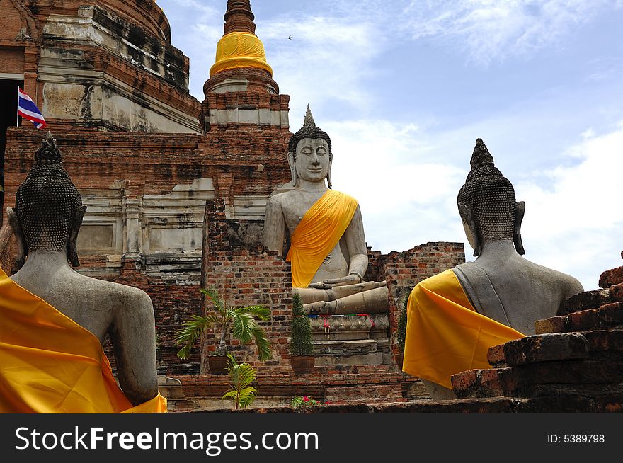 In Thailand the city of Ayutthaya was founded in 1350 today is an impressive archaeological park; here a view of the seated Buddhas at Wat Yai Chai Mongkhon. In Thailand the city of Ayutthaya was founded in 1350 today is an impressive archaeological park; here a view of the seated Buddhas at Wat Yai Chai Mongkhon