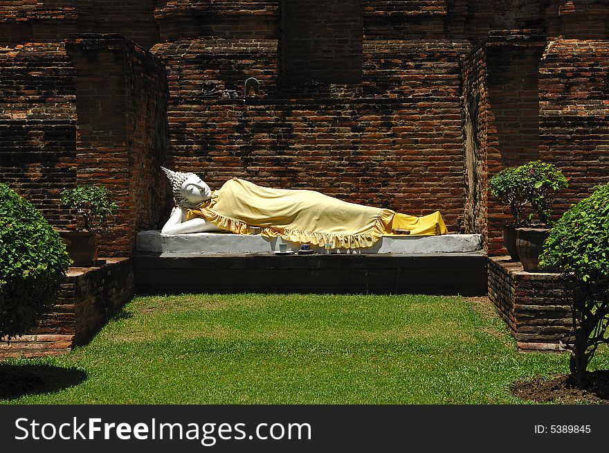 In Thailand the city of Ayutthaya was founded in 1350 today is an impressive archaeological park; here a view of a reclining Buddha at Wat Yai Chai Mongkhon. In Thailand the city of Ayutthaya was founded in 1350 today is an impressive archaeological park; here a view of a reclining Buddha at Wat Yai Chai Mongkhon