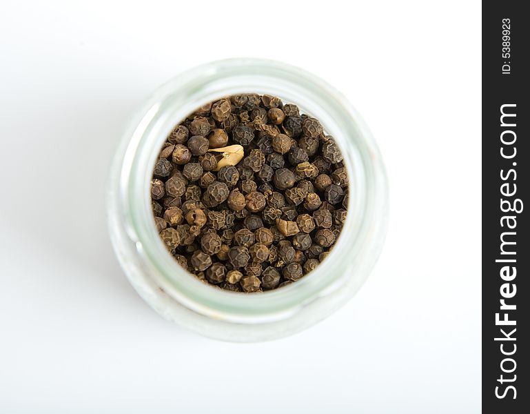 Black pepper in close-up isolated