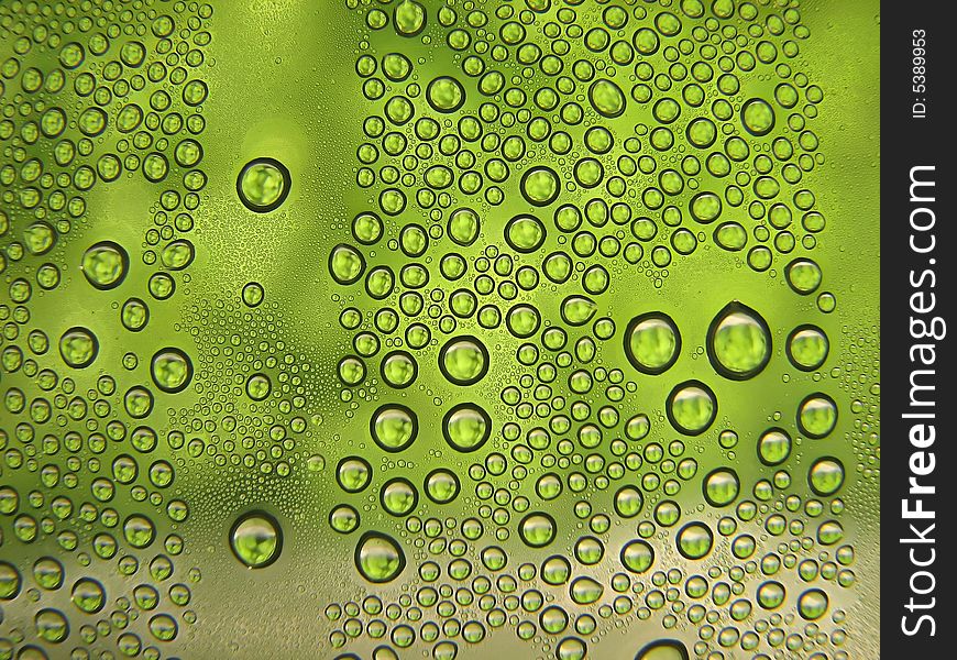 Drops of watwer on green background. Drops of watwer on green background