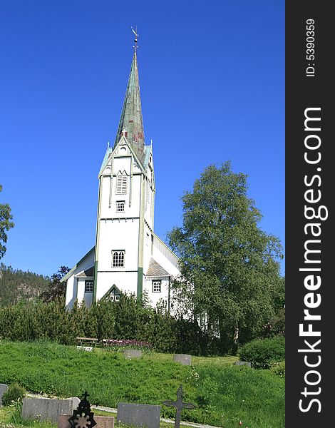 White church and cemetery in Norway