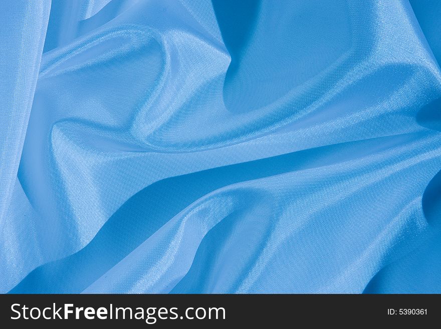 Nice Abstract satin background toned with blue