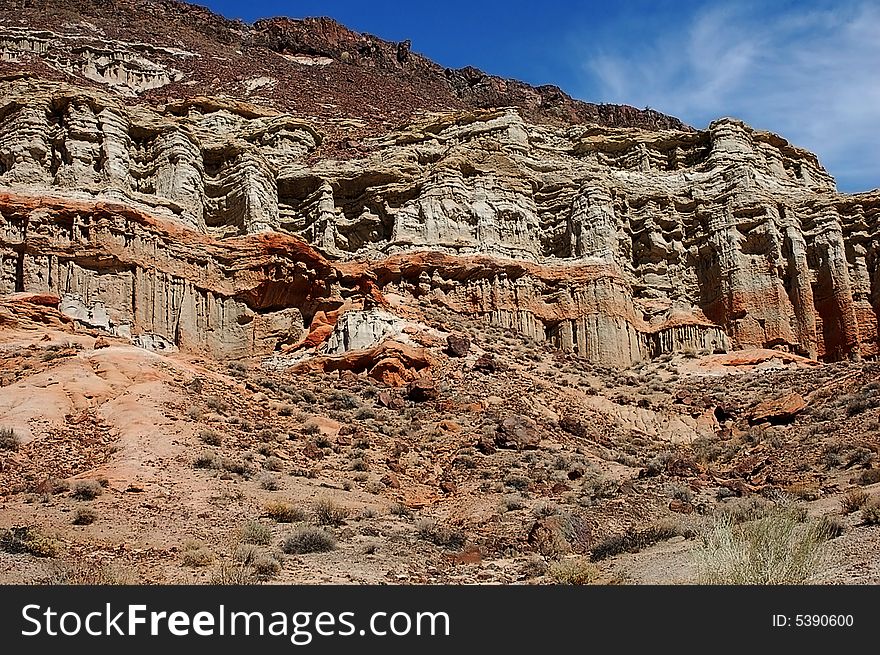 This is a towering cliff in Red Rock Canyon State Park in the Mojave Desert in California.