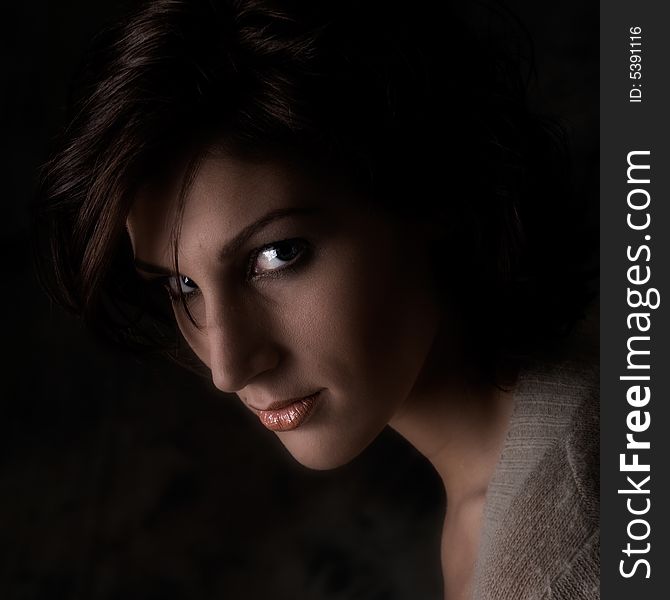 Studio portrait of a pretty brunette lady. Studio portrait of a pretty brunette lady