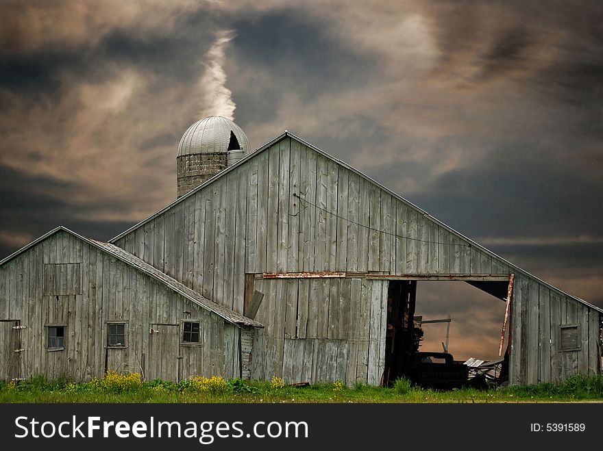 Old barn at sunset time. Old barn at sunset time.