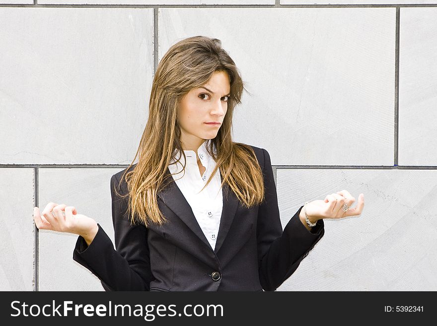 Doubtful businesswoman, isolated on white