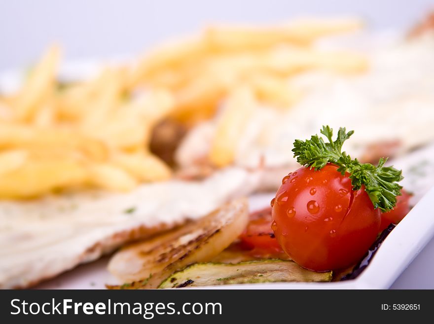 Tomato down French fries plus steak. Tomato down French fries plus steak