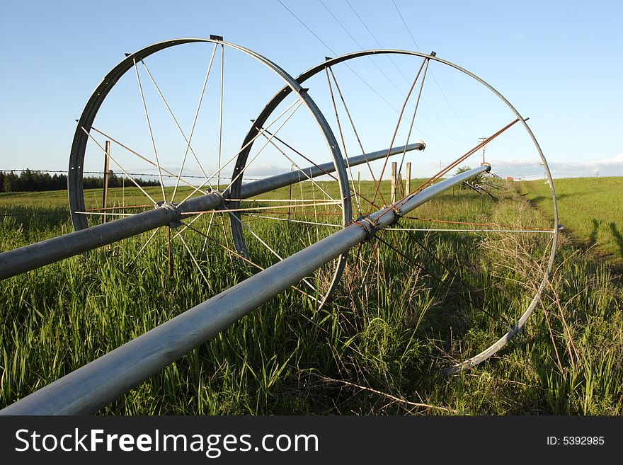 Agricultural irrigation pipes and wheels. Agricultural irrigation pipes and wheels.