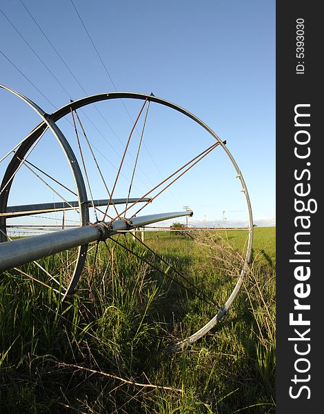 Agricultural irrigation pipes and wheels. Agricultural irrigation pipes and wheels.