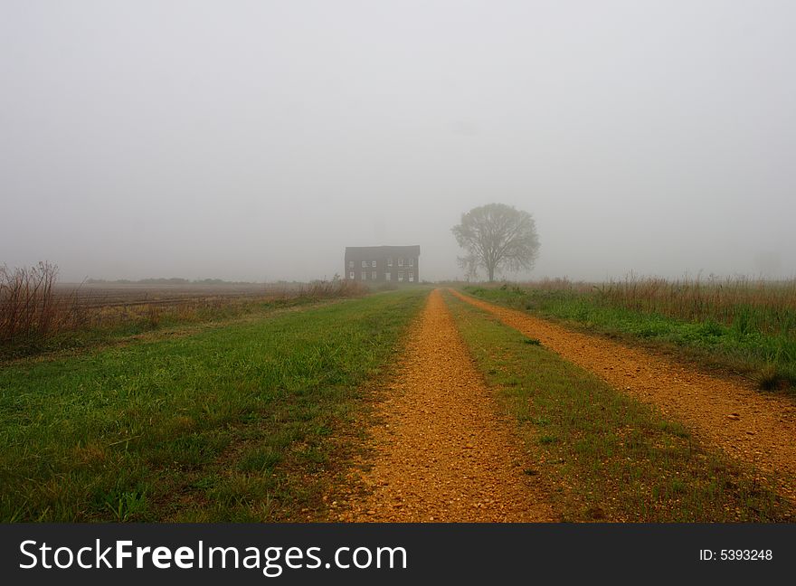 Old farm house on a misty morning. House is from revolutionary time.