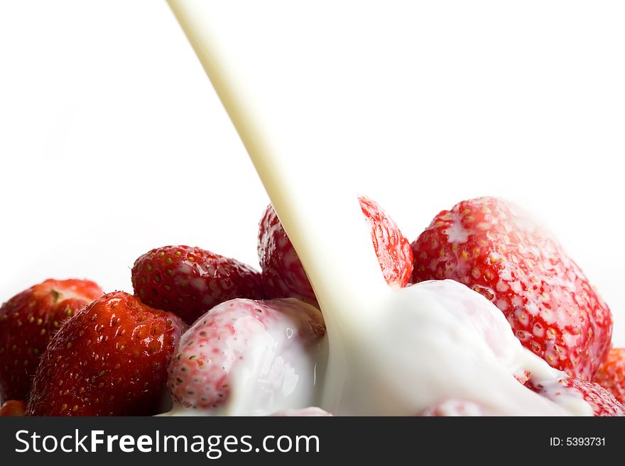 An image of milk with berries. An image of milk with berries