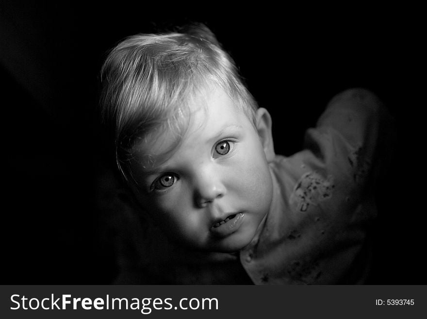 An black and white image of child. An black and white image of child