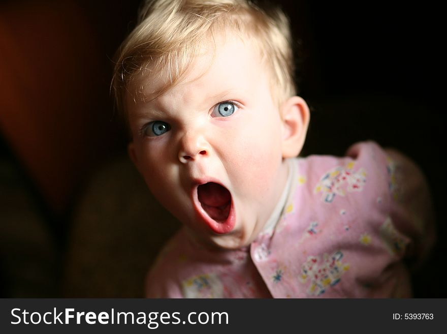 An image of yawning baby