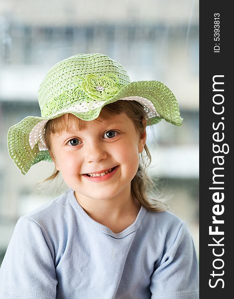 An image of a nice young girl in a hat