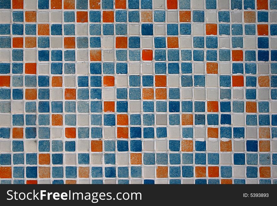 Blue, orange, white tiles in bathroom. Blue, orange, white tiles in bathroom