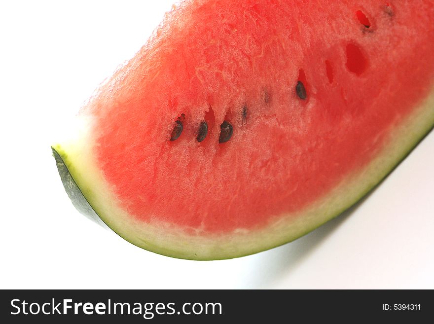 Appetizing slice of watermelon isolated on white