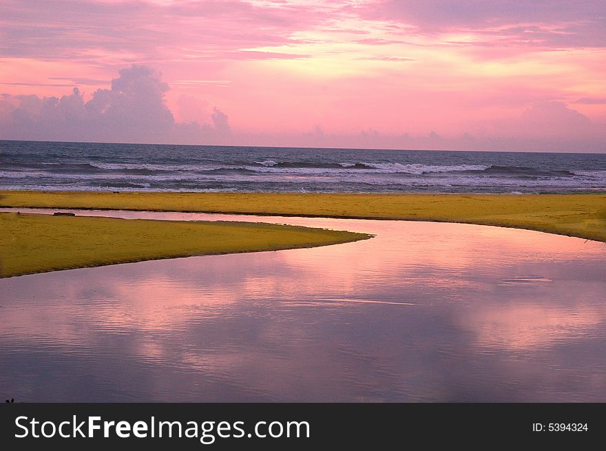 The reflection of the sun set on the sea shore at Goa sea beach. The reflection of the sun set on the sea shore at Goa sea beach.