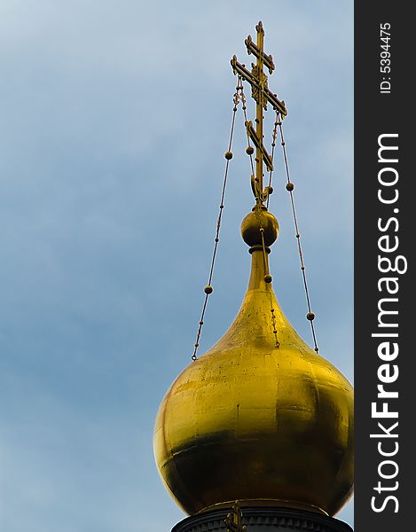 Christian cross on gold cupola