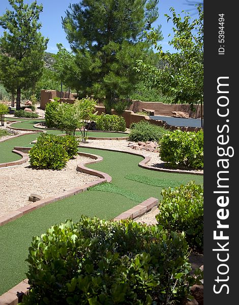 Popular miniature golf game at desert resort. Popular miniature golf game at desert resort