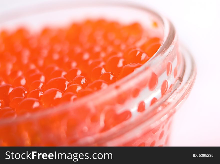 Red caviar isolated on white