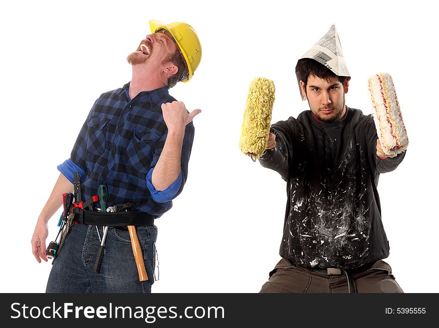 Construction worker tittering and house painter in style cow-boy with paint roller. Construction worker tittering and house painter in style cow-boy with paint roller