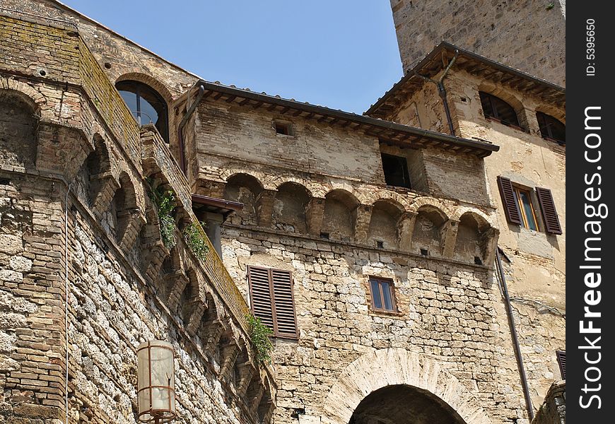 Ancient buildings in the medieval village of S.Gimignano - Siena