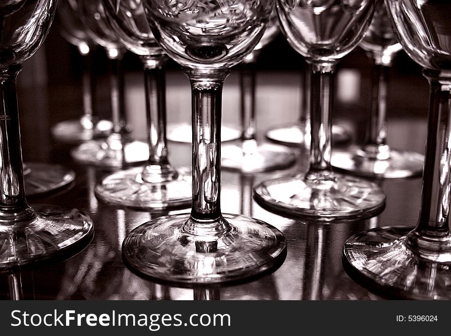 An image of crystal wine globlets with backlighting. An image of crystal wine globlets with backlighting
