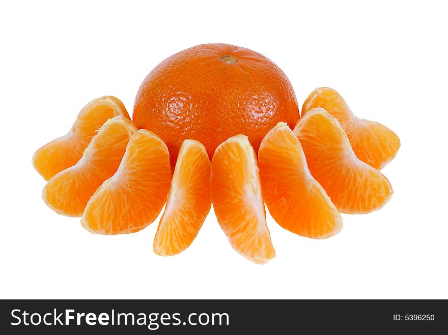 Whole mandarine with particles of fruit isolated on white background