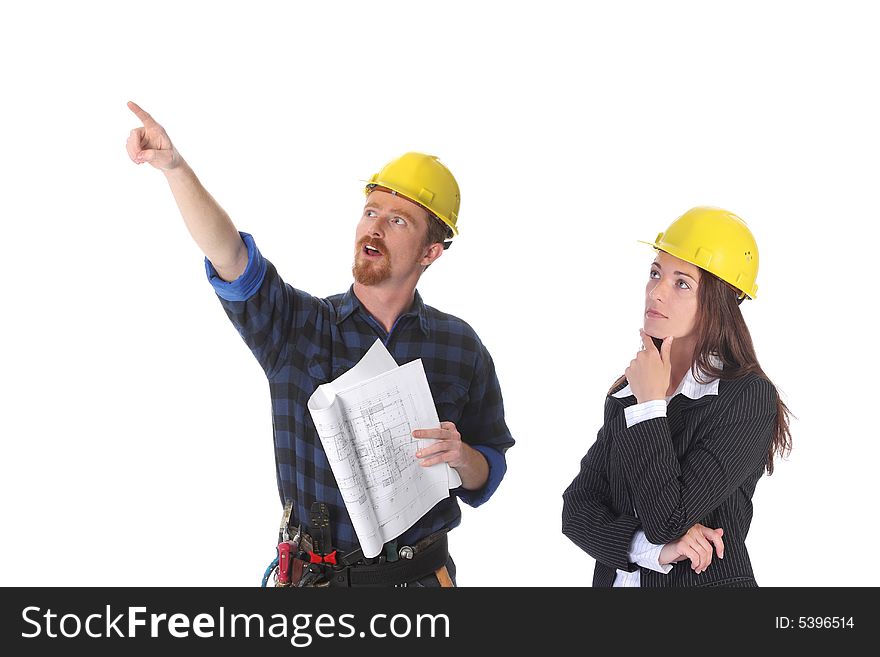 Construction worker pointing on architectural plans and architect. Construction worker pointing on architectural plans and architect