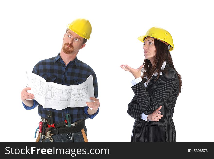 Construction worker and businesswoman with architectural plans. Construction worker and businesswoman with architectural plans