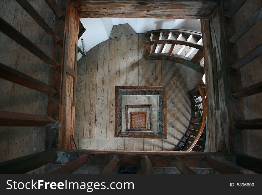 Perspective view on the stairs of the old tower at Lindau old port. Perspective view on the stairs of the old tower at Lindau old port