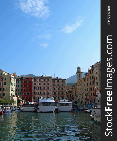 The town and docks of Portofino in Italy. The town and docks of Portofino in Italy