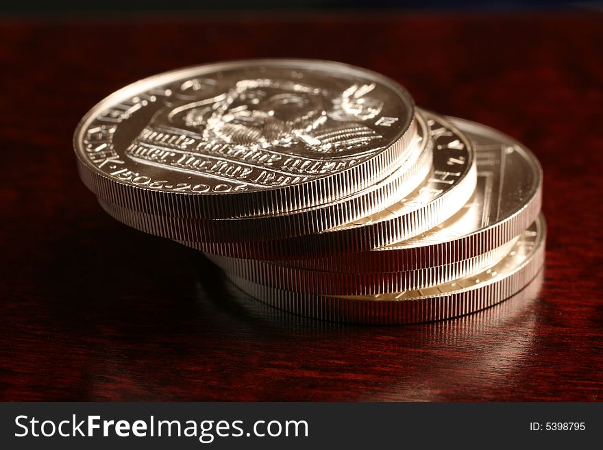 Close-up silver coins on mahagon box