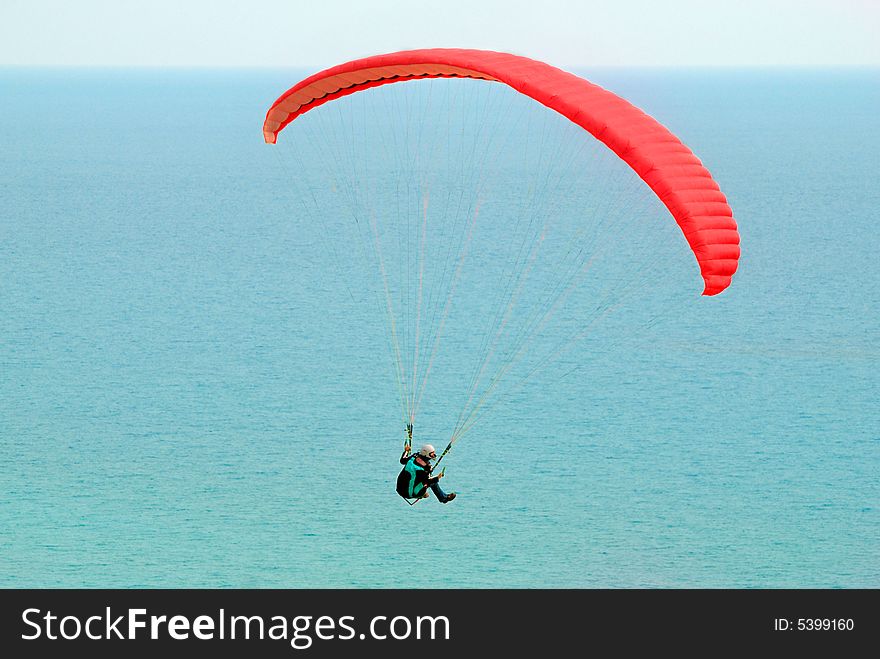 Paraglider over the Mediterranean sea, Cyprus. Paraglider over the Mediterranean sea, Cyprus.