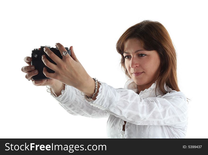 Young woman with old camera isolated on white background