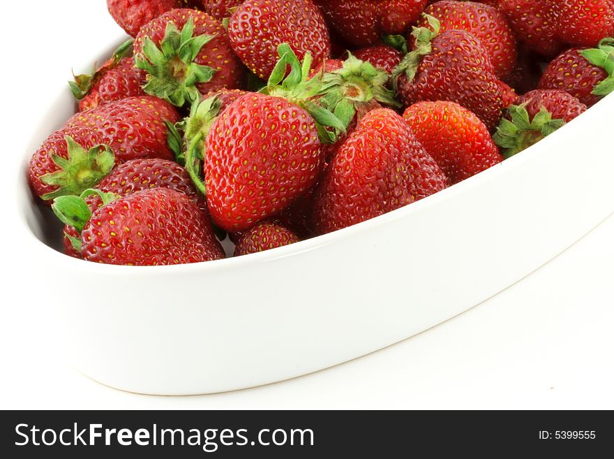 Some fresh strawberries; white background
