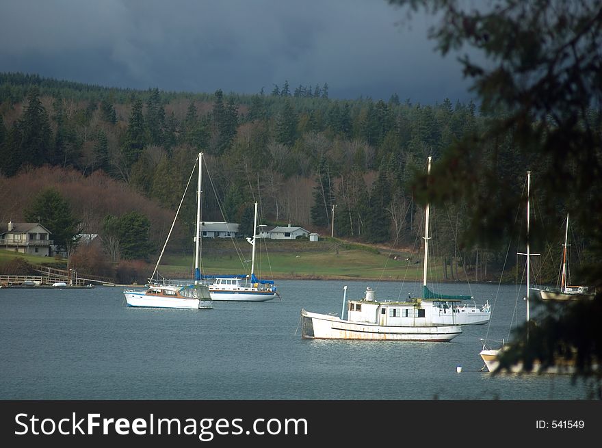 Sailboats in the harbor on a stormy day