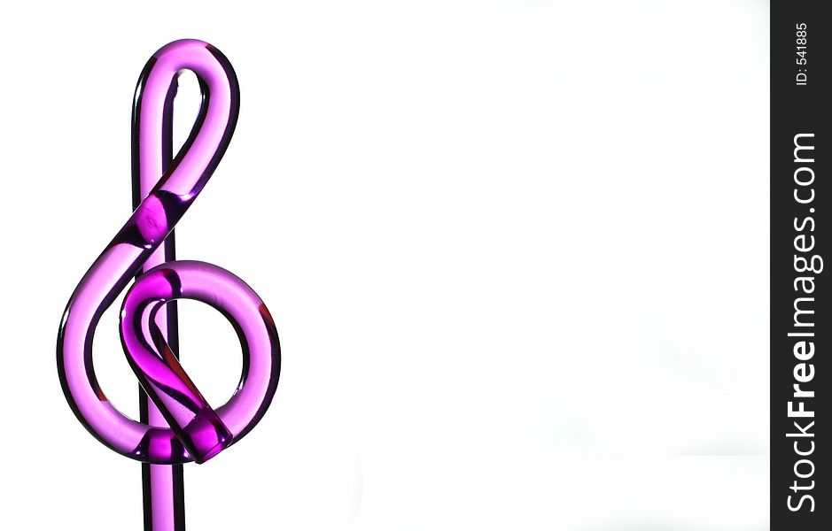 Purple glass treble clef on white background. Purple glass treble clef on white background