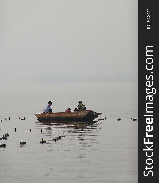 Chinese boat on hangzhou lake. Chinese boat on hangzhou lake