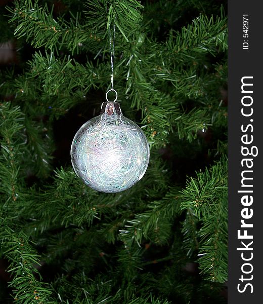 Isolated tree decoration on a artificial tree. Isolated tree decoration on a artificial tree