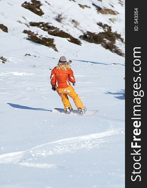 Orange snowboard girl